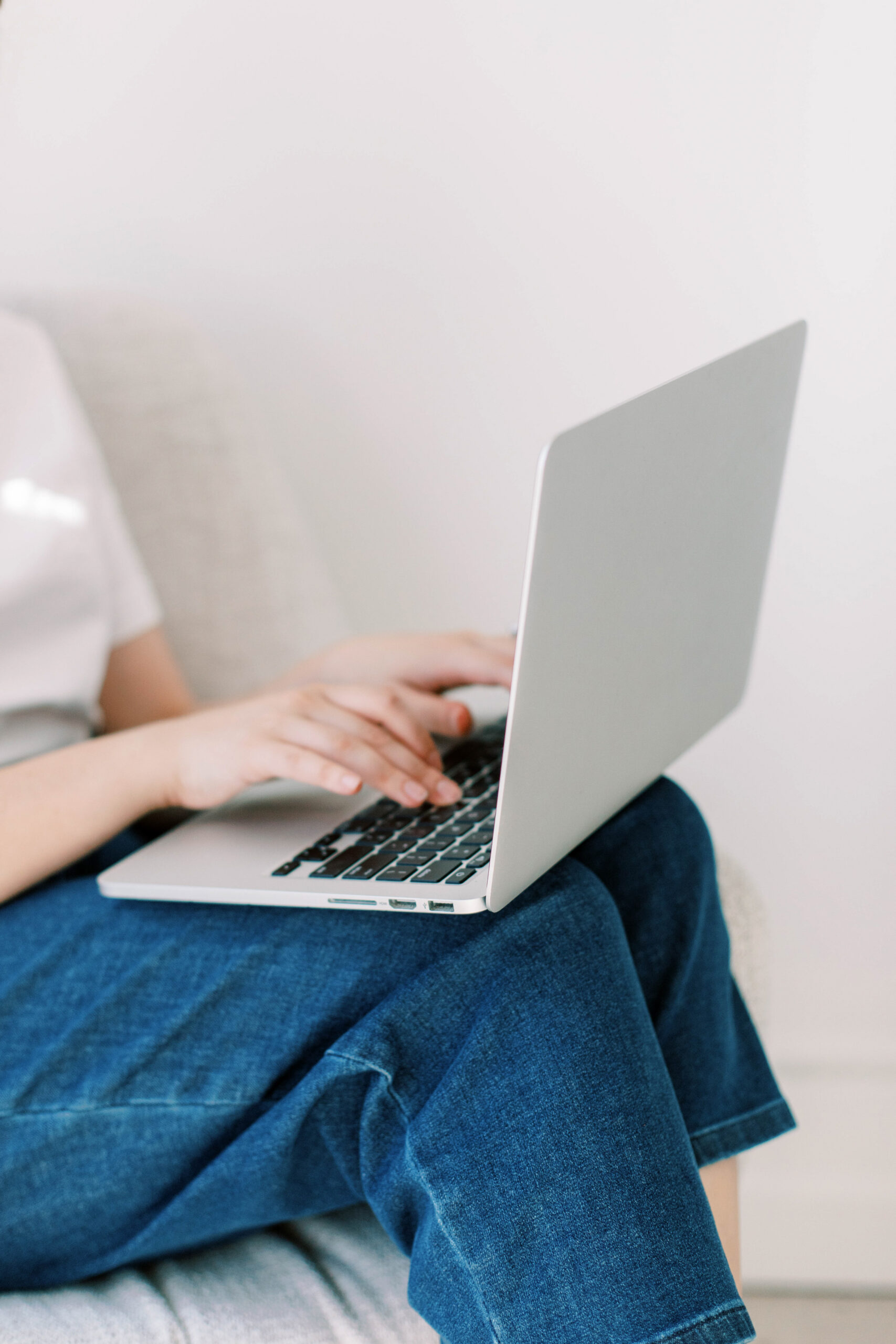 Wedding professional reviewing CRM software on a laptop